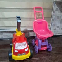 تعدادی اسباب بازی و ماشین کالسکه خرس موتور