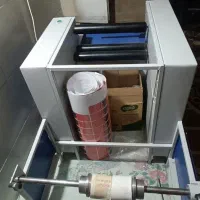 دستگاه رول کن سفره یکبار مصرف و کیسه زباله