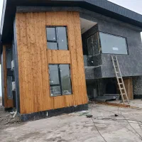 نصب چوب ترمو نما ساختمان سازنده پله گرد با پلی وود|خدمات پیشه و مهارت|رشت, منظریه|دیوار