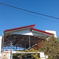 اجرای شیروانی آردواز سایبان حیاط جوشکاری
