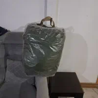 کیسه خواب و پالتو