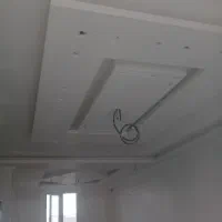 کارگر گچکاری . شاگرد استاد