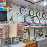 ساعت دیواری و براکت پایه تلویزیون صنایع چوب حنفی