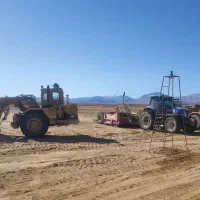 تسطیح و تراز کردن زمین با اسکریپر