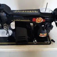 چرخ خیاطی|چرخ خیاطی و ریسندگی|مهاجران, |دیوار