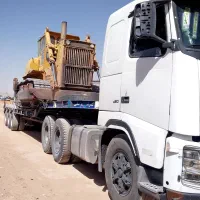 کمرشکن.حمل دستگاه های راهسازی