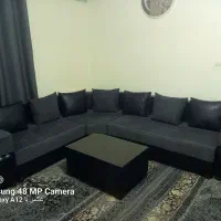 مبل ال هفت نفره مخمل مازراتی طوسی و چرم طرح دار