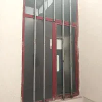 پنجره اهنی .در انباری .درب چوبی  وضایعات اهن