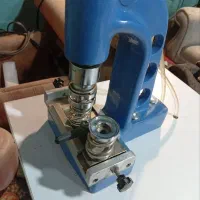 دستگاه دکمه زن بادی