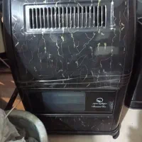 بخاری گازی با دودکش سه عدد میز تلویزیون