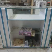 ویترین فروشکاه وصندلی آرایشگاهی