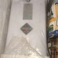آبگرمکن و یخچال کوچک نو و...