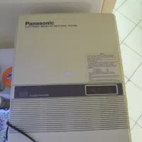 گوشی تلفن گیگاست و دستگاه سانترال پاناسونیک