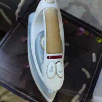 اتو دستی فقط دکمه بخار کار نمیکنه