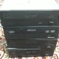 تعدادی دی وی دی رایترساتا بلندگو اسپیکر