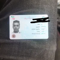 کیف پول  مشکی شامل مدارک گم شده