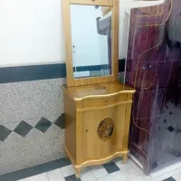 اینه کنسول طلایی رنگ