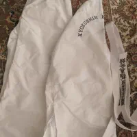 (لباس کاراته سفید نو) (لباس قرمز در حد نو)