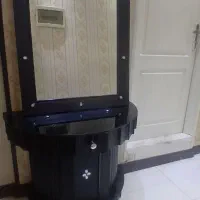 اینه و کنسول سالم به علت جابجایی بفروش میرسد