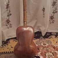 تار کلهر|سازهای سنتی|قم, باغ شریفی|دیوار