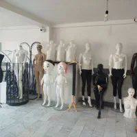 قفسه.مانکن. میز پیشخوان. رگال. چوب لباسی ویترین