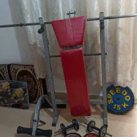 میز ورزشی پرس سینه با هالتر و 70کیلو وزنه