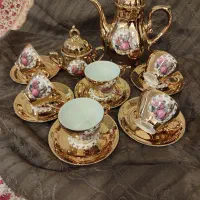 ست فنجان ونعلبکی سرویس گل سیب قدیمی ورق بزن