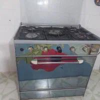 تعدادی لوازم خانه اجاق گاز تخت مبل کمد