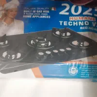 یک عدد گاز صفحه ای شیشه ی و یک عدد هود لمسی