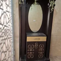 جاکفشی با چوب لباسی