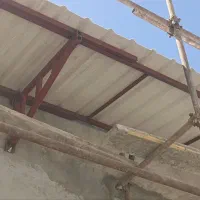 جوشکاری و نصب در کرکره ای و درب جک برقی