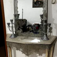 آینه و شمعدان فلزی