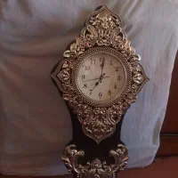 یک عدد ساعت دیواری وخردکن