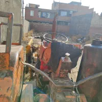 تراکتور با بیل و گاو آهن