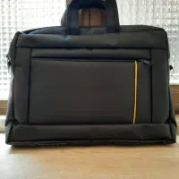 کیف مدرسه و لپ تاپ