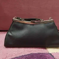 کیف|کیف، کفش، کمربند|قم, ژاندارمها|دیوار