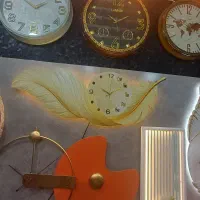 ساعت دیواری چوبی جذاب مدل پر