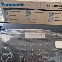 فکس پاناسونیک و ماشین حساب دیحیتال شارپ