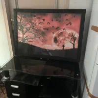 میز زیر تلویزیون و تابلو برقی