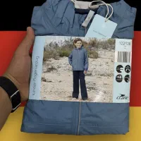 ست کاپشن وشلوار بارانی بچه گانه