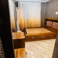 تخت خواب دو نفره  همراه با میز دراور