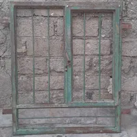 پنجره اهنی یک ونیم در دو