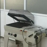 دستگاه شرینگ و سلفن صنعتی کابینی