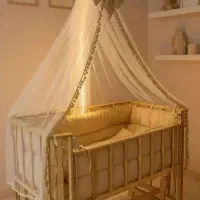 گهواره نوزاد  ،  تخت نوزاد،  کریر،  اغوشی حمل کمک