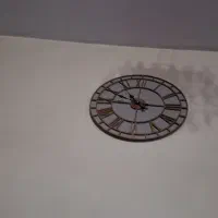 ساعت دیواری آیینه ای