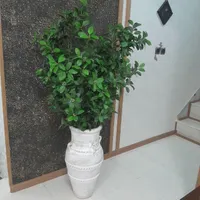 گلدان پتینه به همراه گل مصنوعی