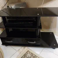 میز تلویزیون و میز جلو مبلی شیشه ای کشودار