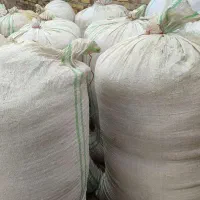 کاه جو وگندم داخل گونی