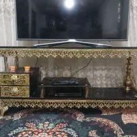 زیر تلویزیون برنج اصل سنگین