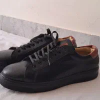 کفش|کیف، کفش، کمربند|قم, نیروگاه|دیوار